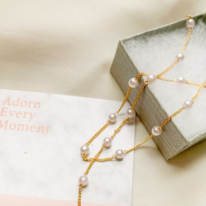 The mask chain neatly arranged on a gift box