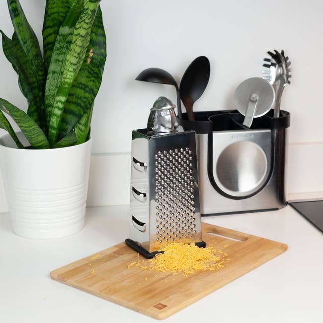 cheese grater with shredder head on it 