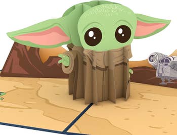 Card open with Baby Yoda popped up in the middle, with a desert background