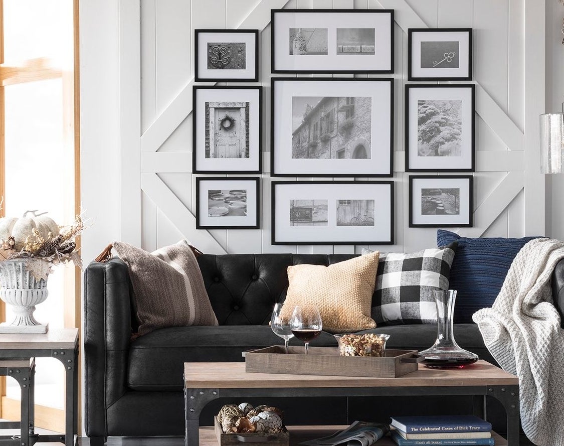 Coffee table with metal frame, wheels, and wooden shelves