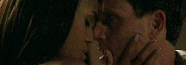 Fitz and Olive from Scandal pressing their faces together, about to get down to business
