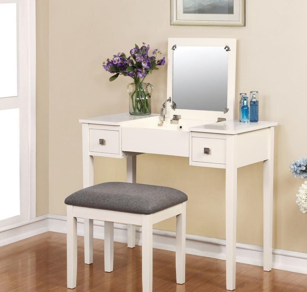White vanity with two drawers and hidden mirror and matching bench 