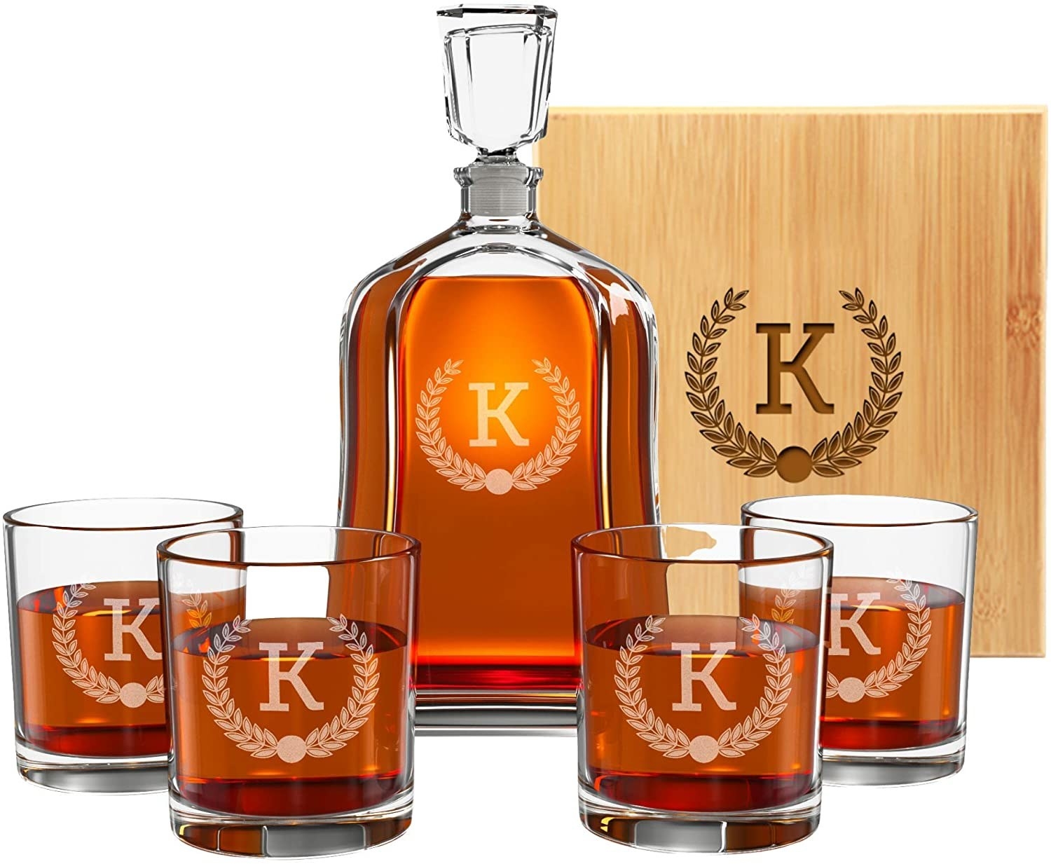 Monogrammed whiskey decanter set, four monogrammed whiskey glasses and a monogrammed wood box