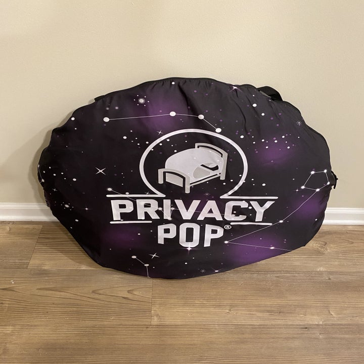 the privacy pop in constellation pattern folded into a circle bag