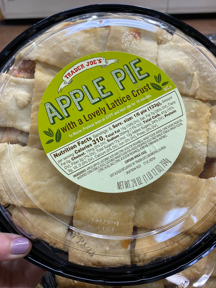 A store-bought apple pie with lattice crust.