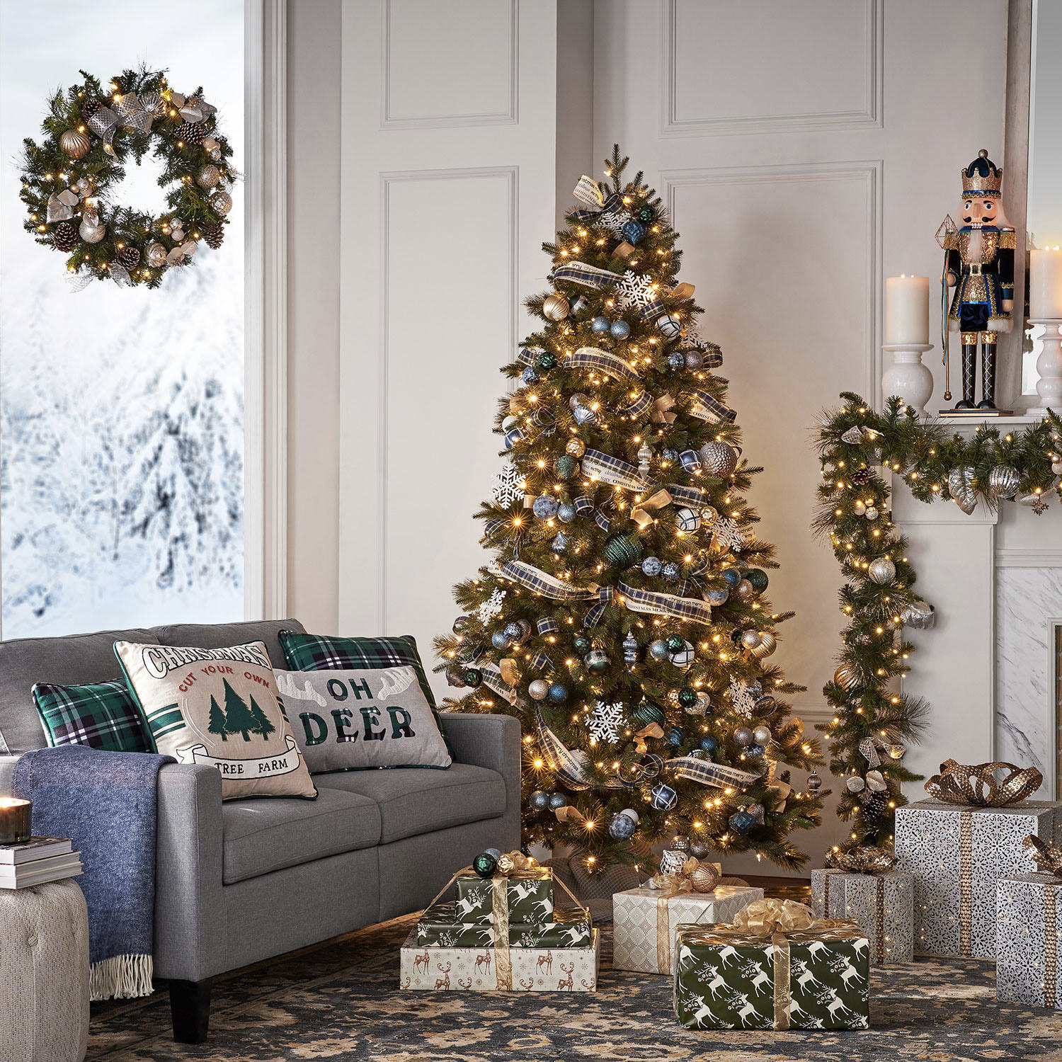 Tree with baubles, white Christmas lights, and ribbon