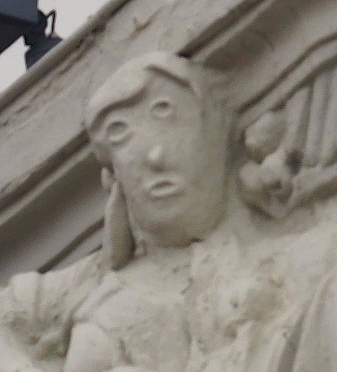 The face of a sculpture that was restored incredibly poorly