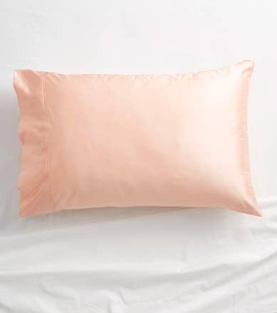 silk pillow on a bed