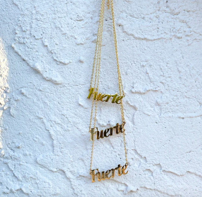 Three "Fuerte" necklaces stacked on top of each other.