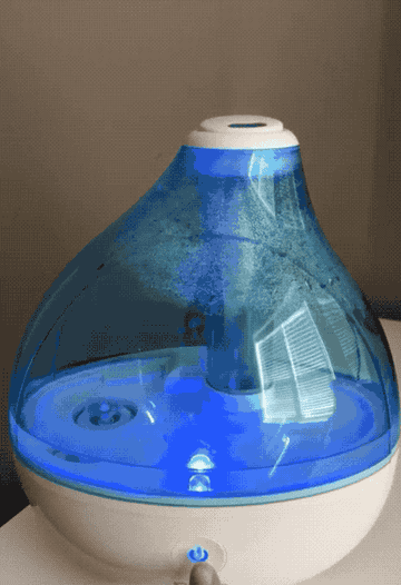A gif of a reviewer turning the humidifier on and off