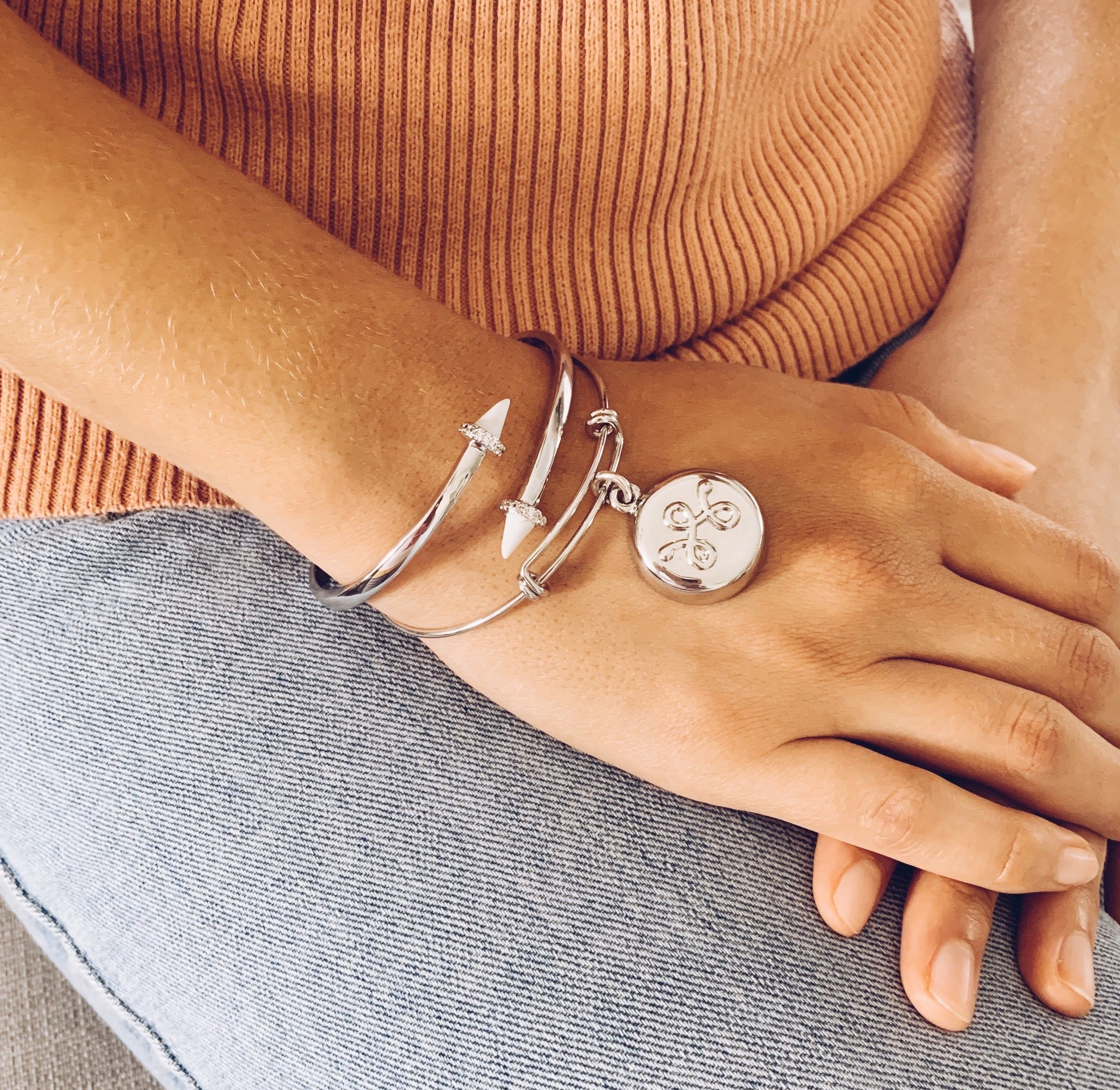 model wearing silver expandable bracelet