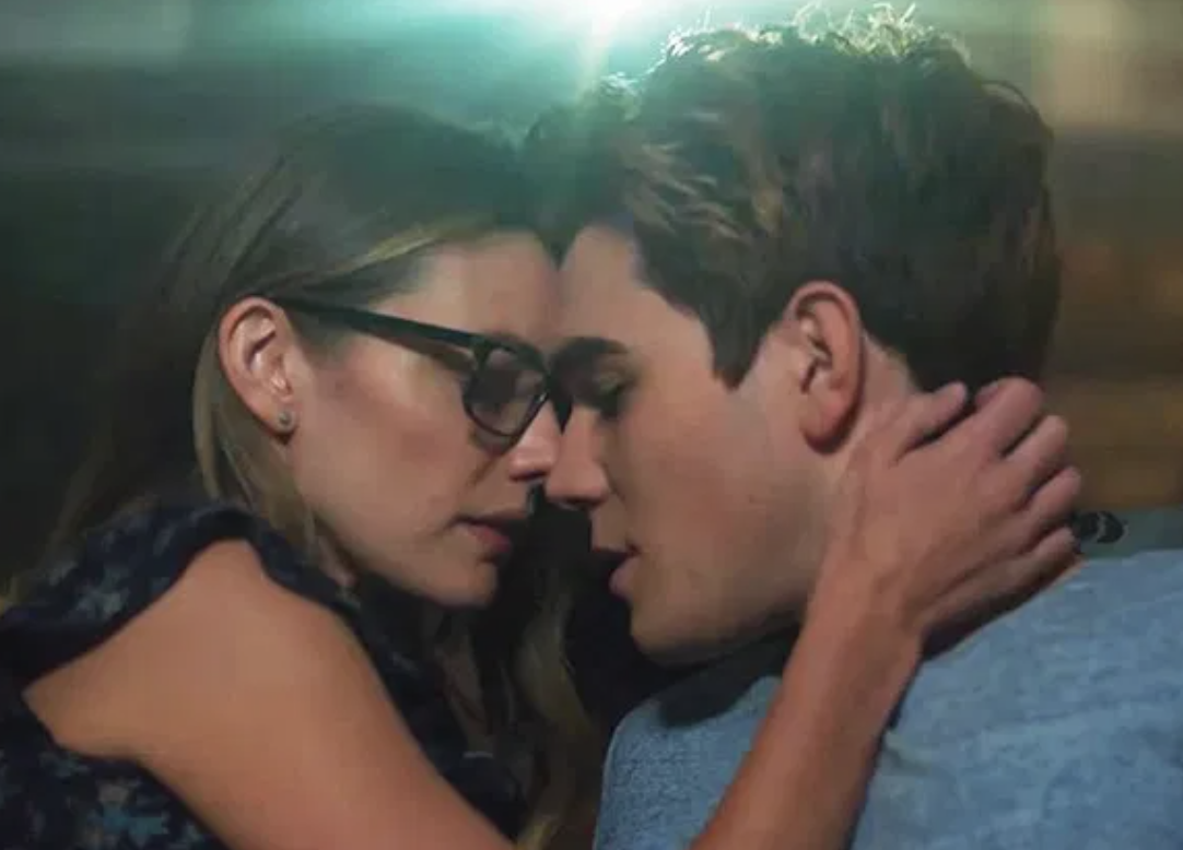 Archie and Ms. Grundy about to kiss.