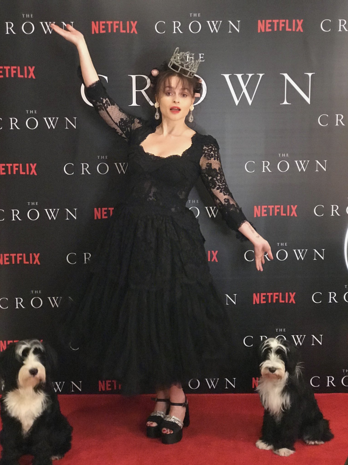 Helena Bonham Carter with her arms raised as if to say, &quot;ta-da!&quot;