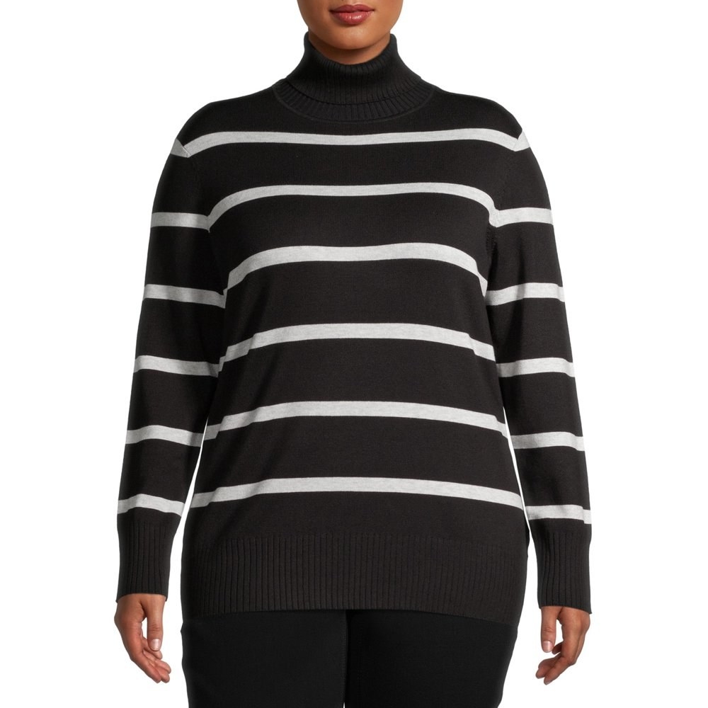 model wears black and white striped turtleneck sweater