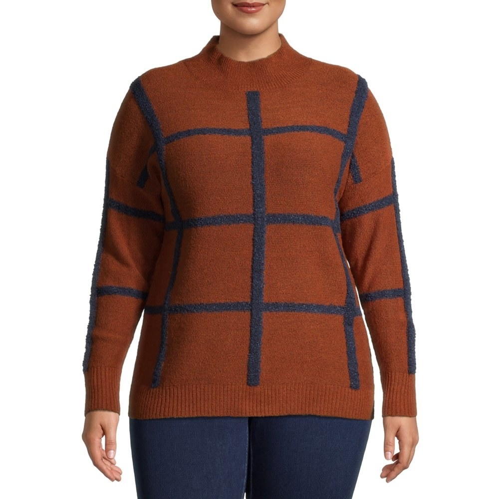 model wears brown and navy windowpane sweater