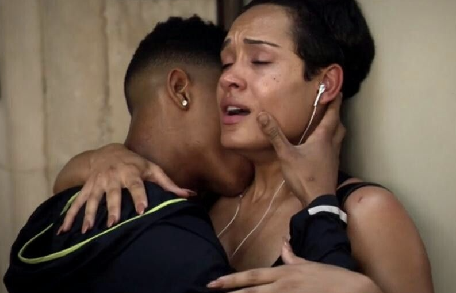Hakeem kissing Anika&#x27;s neck up against a wall while she makes a sexual face.