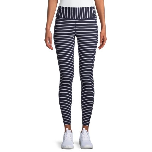 model wears striped athletic leggings