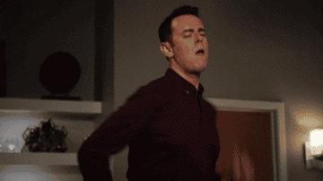 gif of Colin Hanks in the TV show &quot;Life in Pieces&quot; dancing and moving his arms up and down really fast