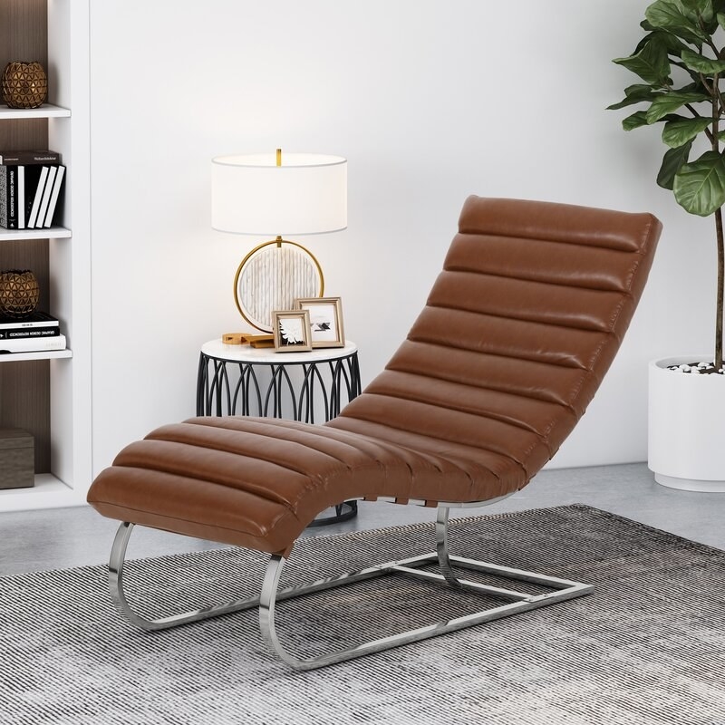 The brown faux leather chair