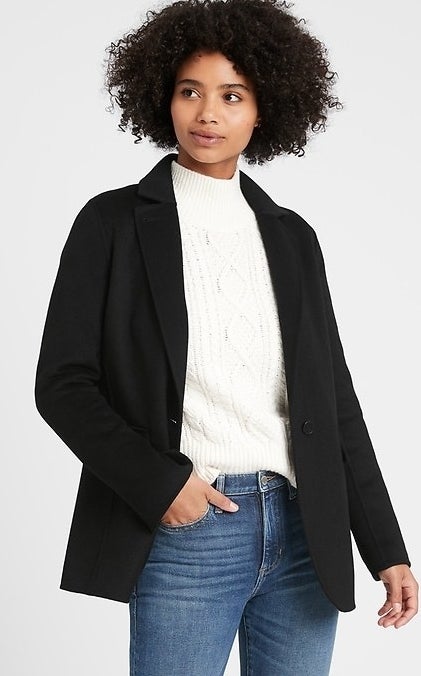 model wearing black blazer jacket