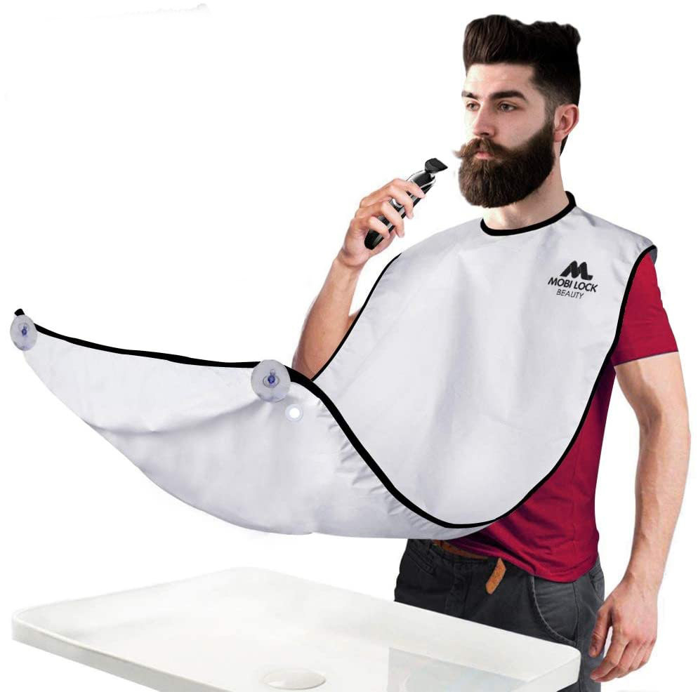 A person wearing a long bib around their neck The ends are attached to a mirror with suction cups