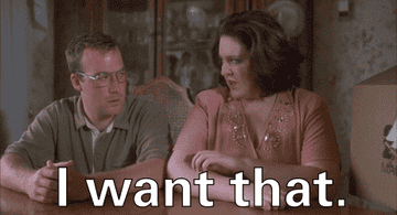 A GIF of someone saying I want that to another person