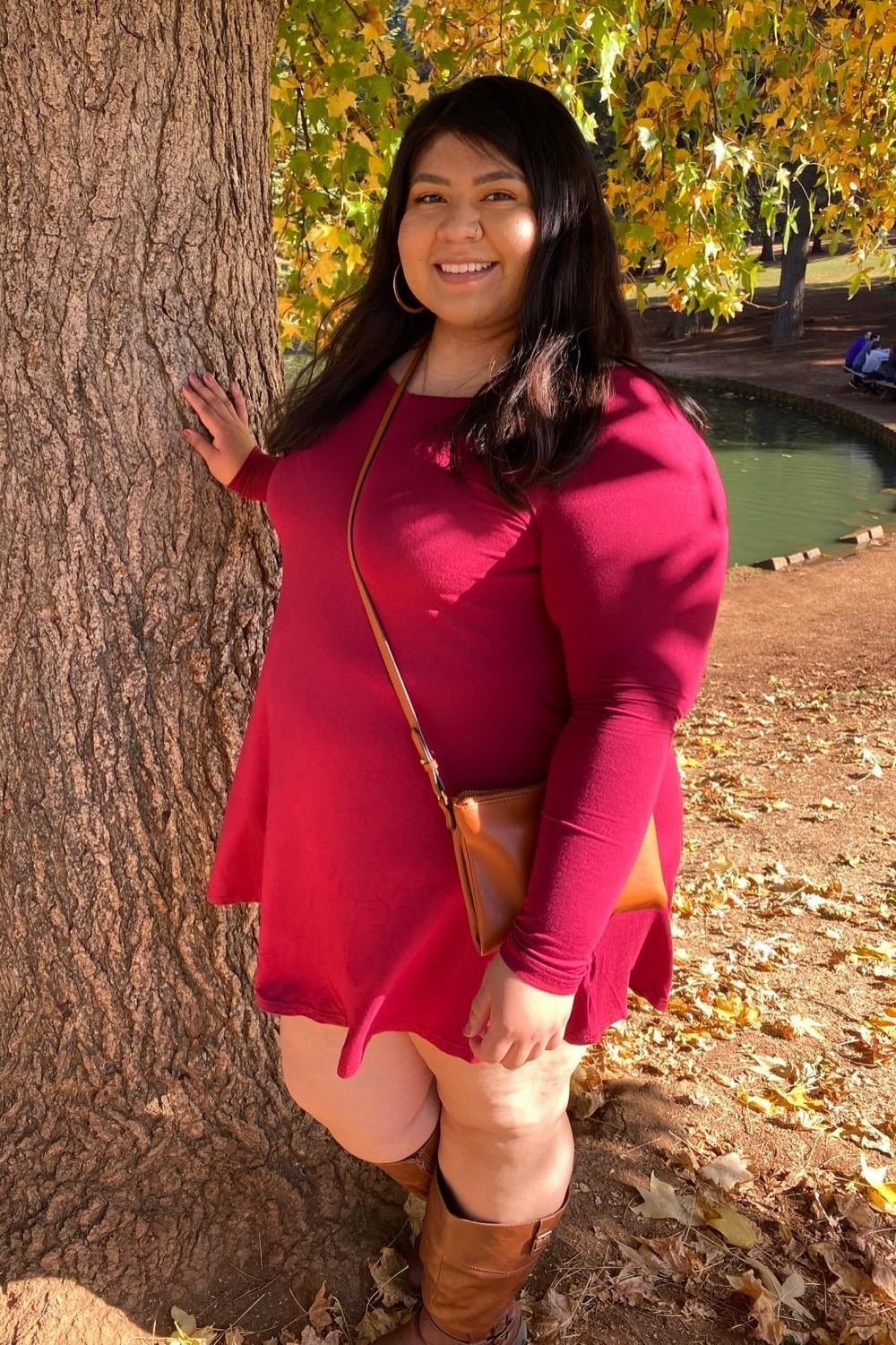 Reviewer wearing red dress