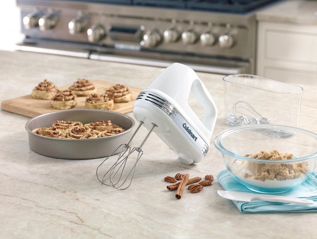The hand mixer being used to make cinnamon rolls 