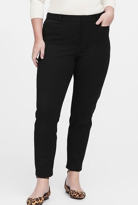 model wearing the black trousers