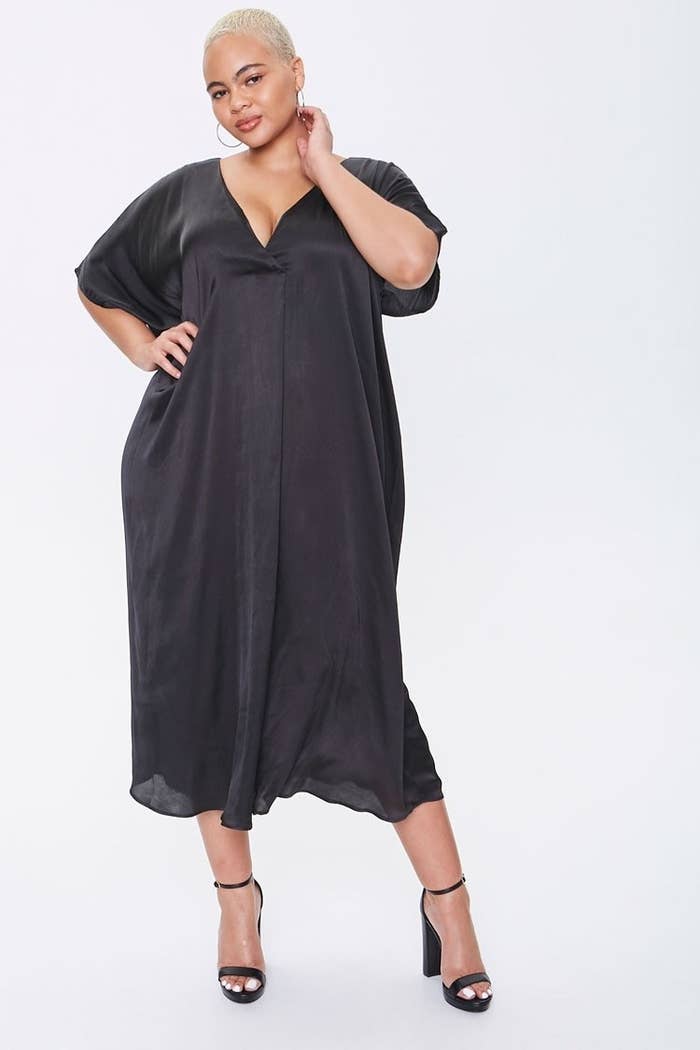 Model wearing black dress