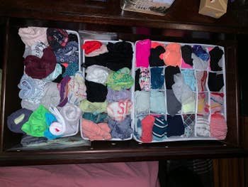 Reviewer's organized bras and underwear in the light gray drawer divider in their dresser
