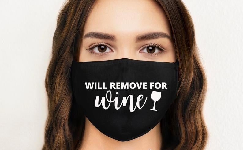 A face mask that says will remove for wine