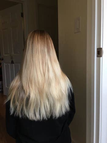 Reviewer's straight blonde hair