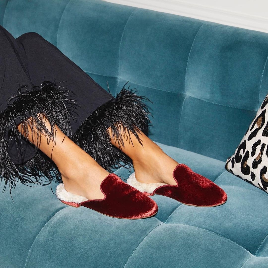 the slides in burgundy velvet with a cream faux fur inside lining 