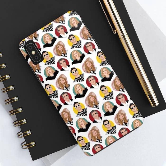 The white, green, red, yellow, and pink phone case printed with the faces of Johnny, Moira, David, and Alexis