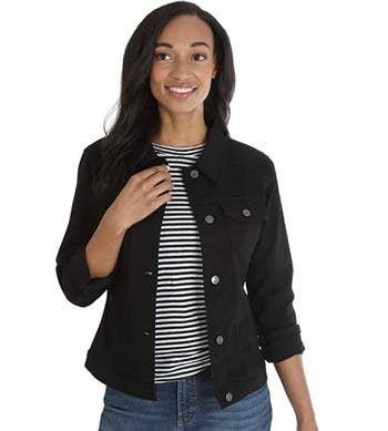 Model wearing black jean jacket