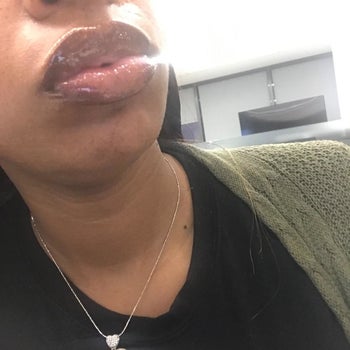 Reviewer wearing the gloss