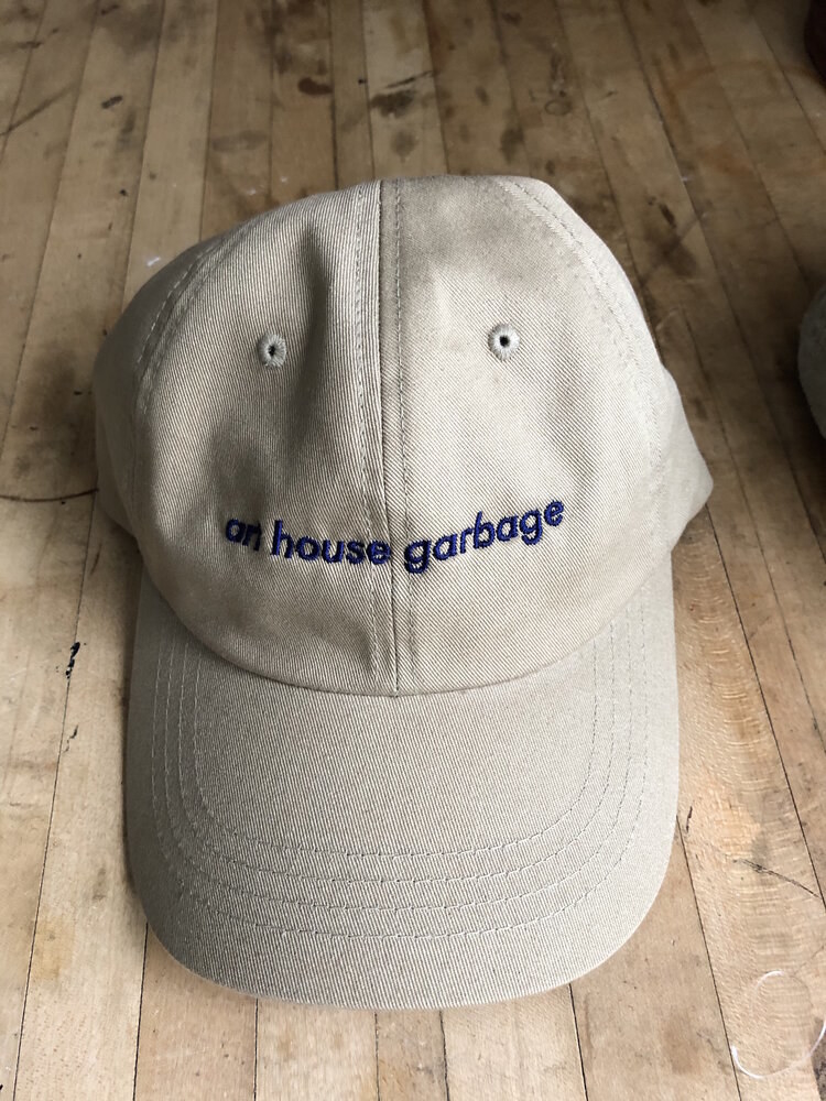 Hat that reads &quot;art house garbage&quot; 