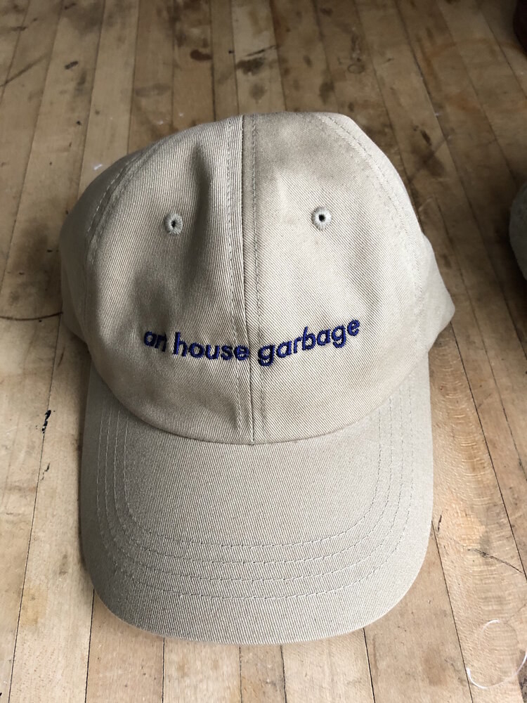 Hat that reads "art house garbage"