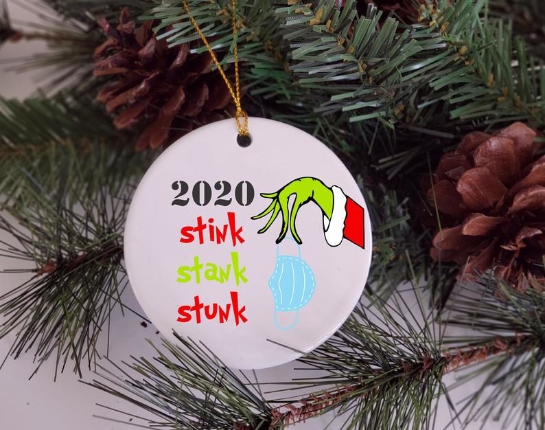 An ornament that says 2020 stink stank stunk