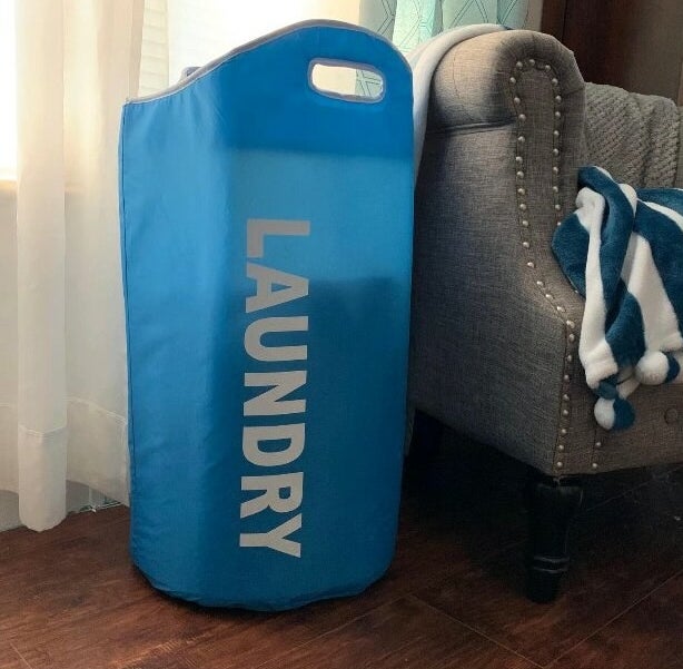 The blue laundry hamper