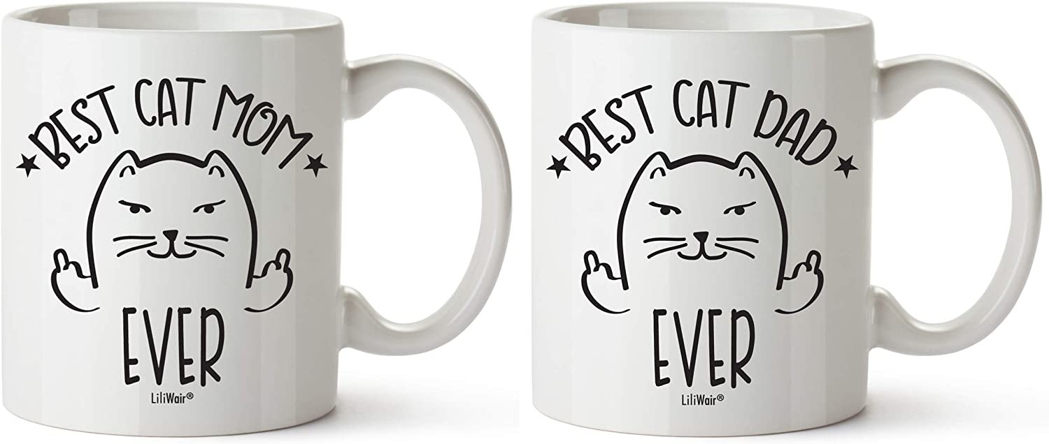 Two white mugs with a cartoon cat that say best cat mom ever and best cat dad ever