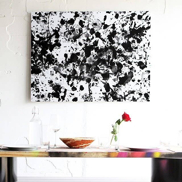 A black and white abstract painting made with the kit