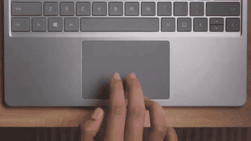 A person scrolling on the trackpad