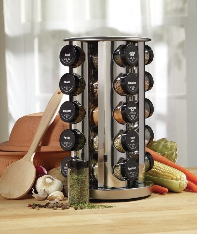 a spice rack filled with spices on a counter