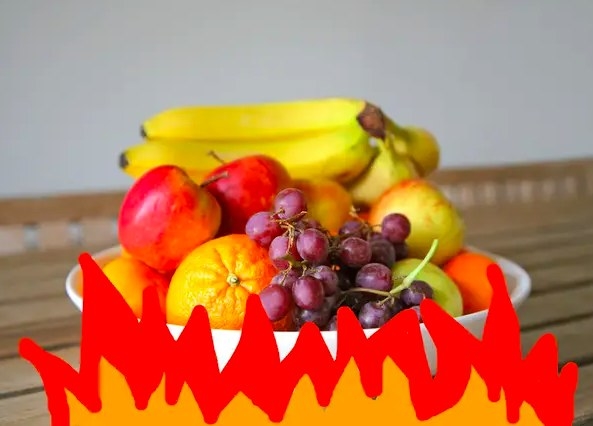 Image of a bowl of fruit being heated by a cartoonish fire