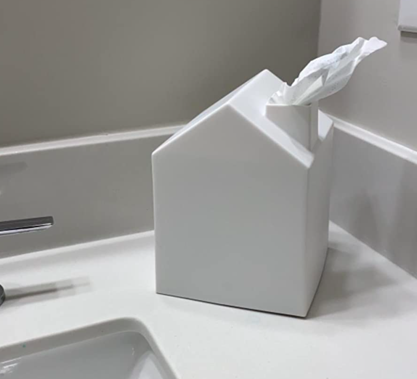 Minimalist tissue box cover shaped like a house 