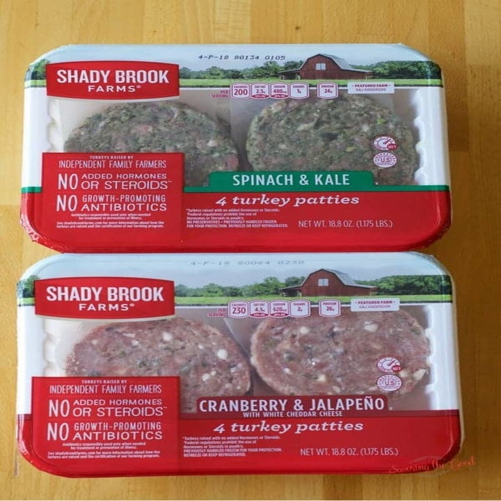 Two packages of store bought turkey burgers.