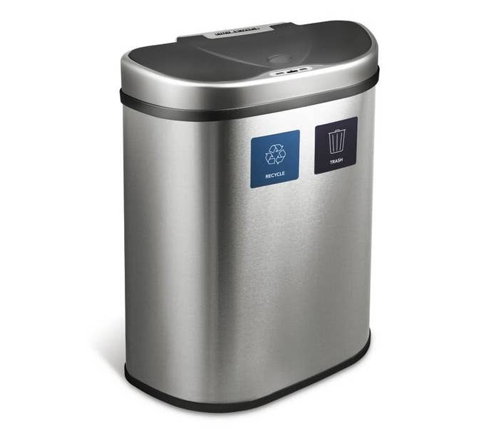 The stainless-steel trash can with labeled compartments for recycling and trash