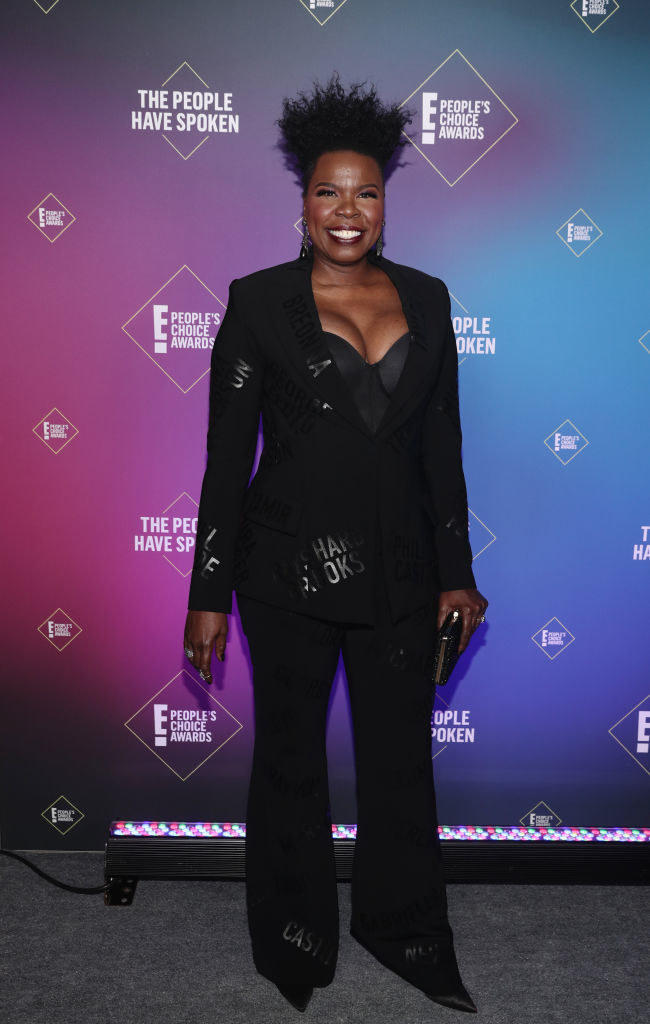 Leslie Jones wears a stylish blazer and matching pants that feature the names of Breonna Taylor and George Floyd, among others for the Black Lives Matter movement